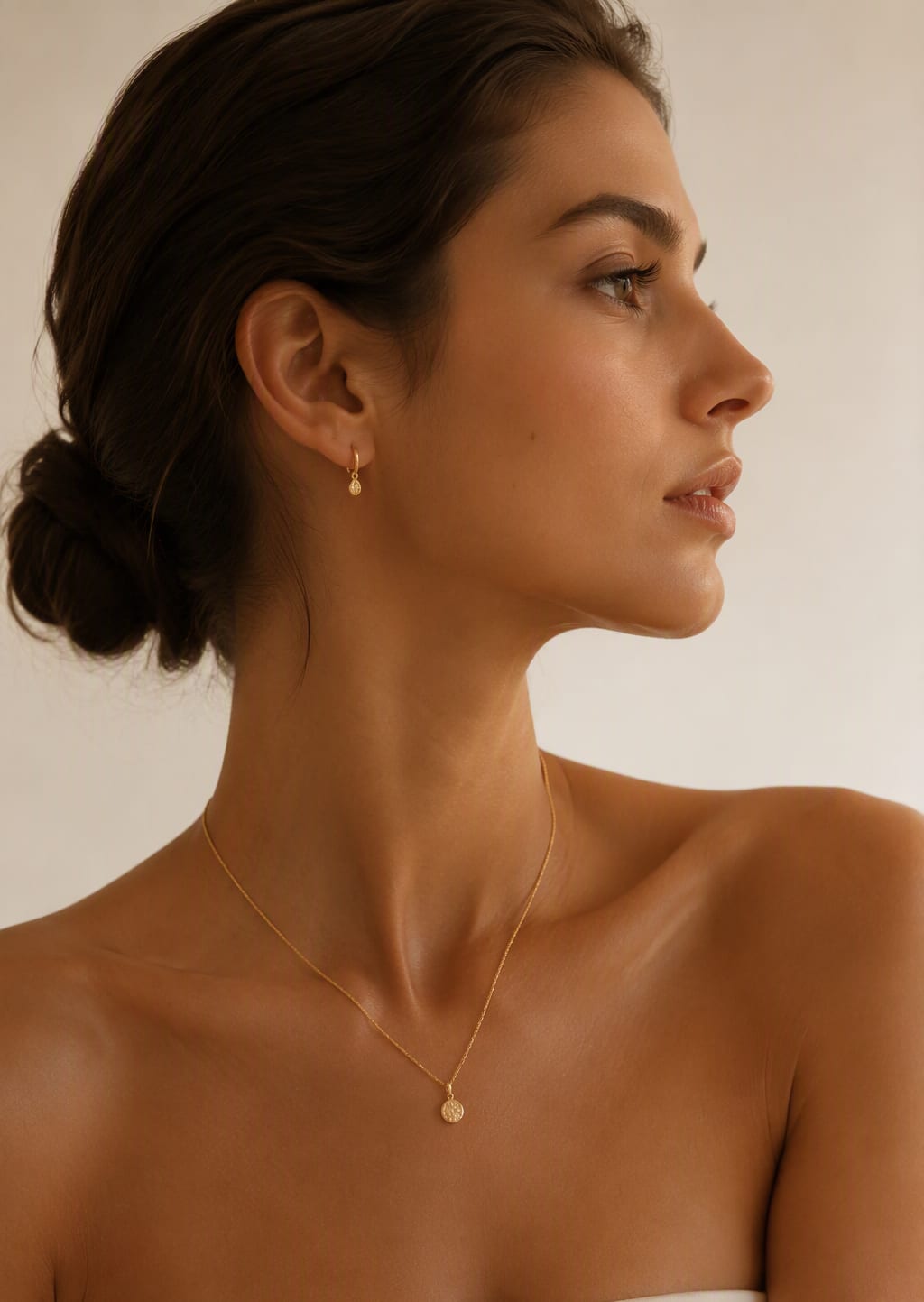 Editorial — gold worn on bare skin